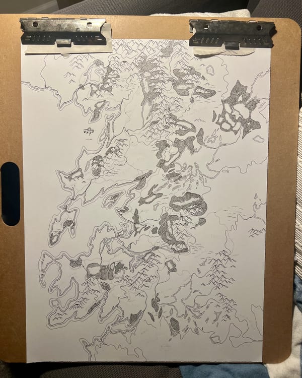 Pen-and-ink fantasy map clipped to a drawing board.