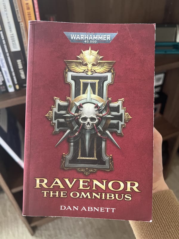 Ravenor 40k Omnibus with an inquisitorial rosette layered over a red background.