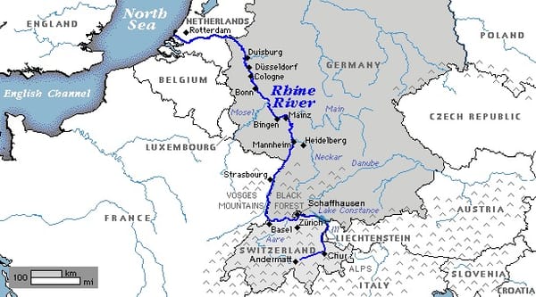 The Rhine, from its origins in the Swiss Alps to Rotterdam and the North Sea. Major cities line its course---Basel, Strasbourg, Mainz, Cologne, Düsseldorf---with tributaries like the Moselle and Neckar feeding into it.