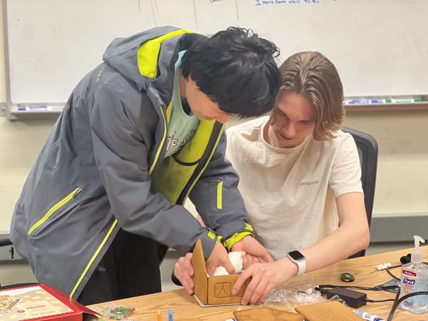 Kev and I making a gingerbread house in the UPL.